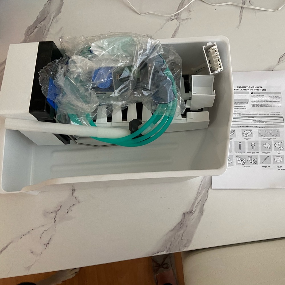 Ice maker for refrigerator
